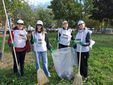 Volontari Torino Spazio Pubblico e McDonald’s puliscono parco Peccei