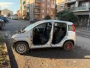 La Fiat Panda smontata in via Pramollo, a Mirafiori Sud