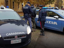 Auto dei carabinieri e della Polizia