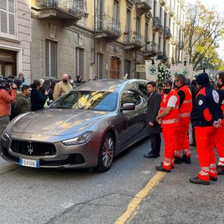 Un momento dei funerali di Melis