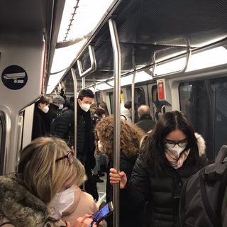 passeggeri di un mezzo pubblico