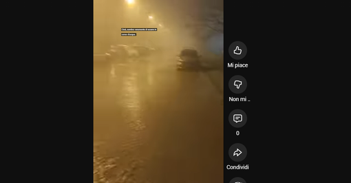 L'immagine della strada allagata a Grugliasco, la scorsa notte