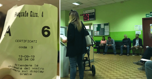 Coda all'anagrafe con biglietto di attesa Coda all'anagrafe con biglietto di attesa