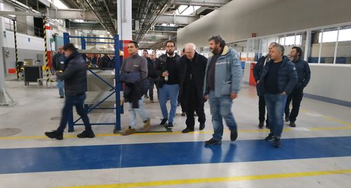 Nella foto, l'arcivescovo Nosiglia con i sindacati ai tempi della vertenza Embraco