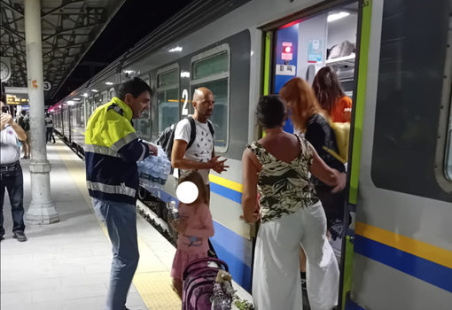 Passeggeri scesi dal treno Passeggeri scesi dal treno