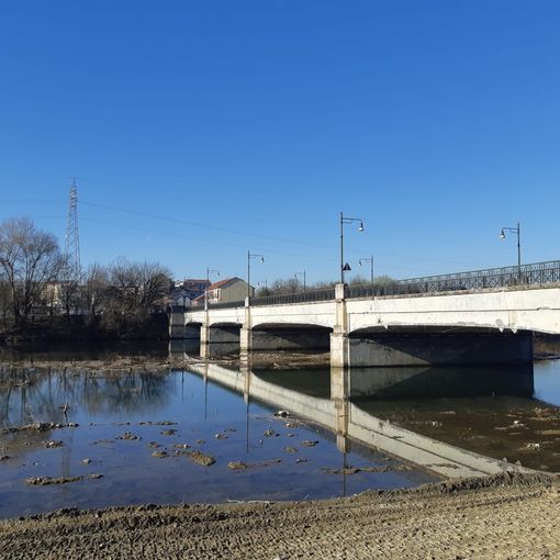 fiume stura con ponte che lo supera