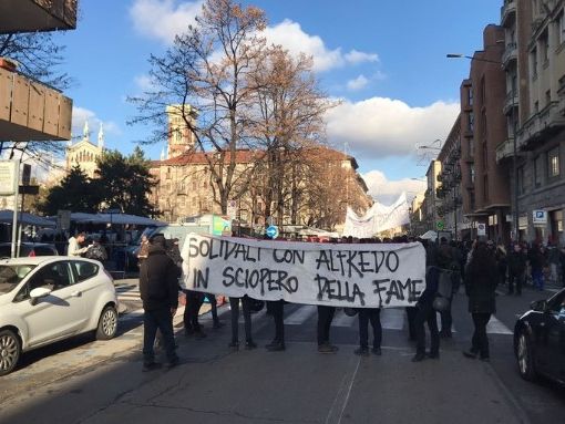 foto d'archivio e locandina corteo 14-1