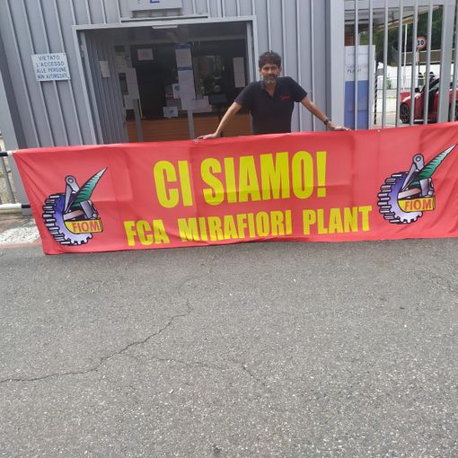 volantinaggio fiom a cancelli mirafiori
