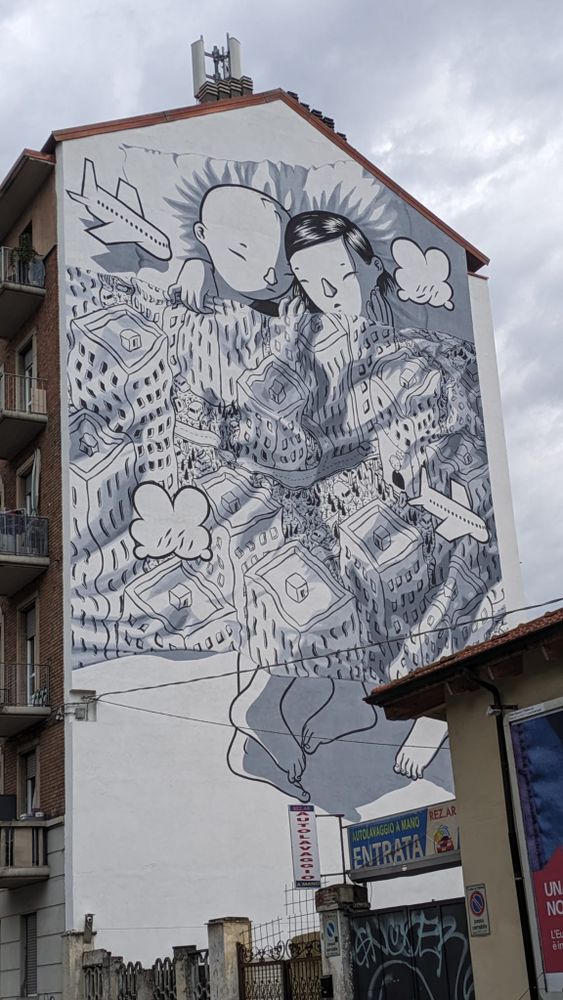 Barriera di Milano: concluso il nuovo murales di Millo in piazza Bottesini Barriera di Milano: concluso il nuovo murales di Millo in piazza Bottesini