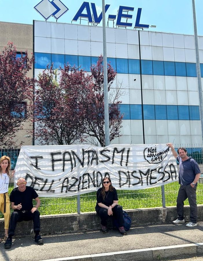 striscione di protesta dei lavoratori