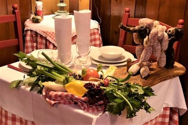 Alla trattoria Tromlin, dove si assaggiano le tradizioni mentre si canta tutti insieme