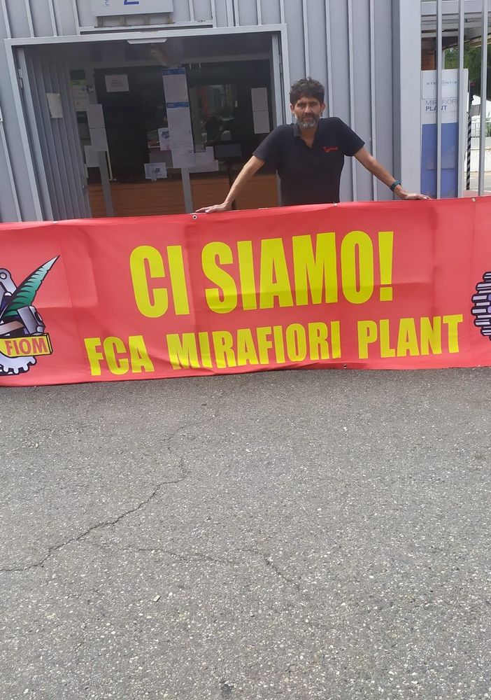 volantinaggio fiom a cancelli mirafiori