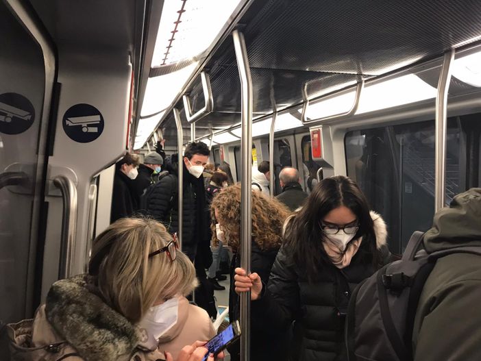 passeggeri di un mezzo pubblico