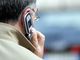 uomo al telefono