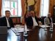 Rettore Geuna con due docenti ai suoi lati