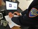 Frode informatica ai danni di un'azienda, quarantenne arrestato per riciclaggio mentre preleva al bancomat