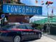 Camping Lungomare con auto dei carabinieri di fronte