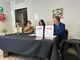 tavolata di relatori a un convegno