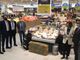 Persone in un supermercato