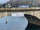 Clima: protesta Extinction Rebellion, attivisti si calano sul Po e bloccano la circolazione [VIDEO]