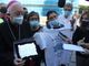 Mons. Cesare Nosiglia con i lavoratori Embraco