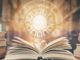 libro aperto e segni zodiacali