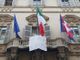 Lo striscione esposto fuori da Palazzo Lascaris