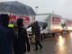 Protesta di lavoratori sotto la pioggia
