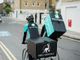 rider Deliveroo in bicicletta