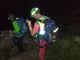 Uomini del soccorso alpino in azione