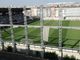 Stadio visto dall'alto con una tribuna coperta e la scritta Torino Fc