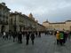 Piazza Castello persone che passeggiano zona gialla