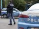 poliziotto e auto della Polizia