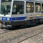 Bici sotto un tram in piazza Castello, deviata la linea 15