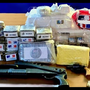 Cocaina, 40 chili di hashish e pistole in un box auto: arrestati in quattro