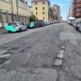 Buche e strada dissestata in via Forlì