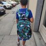 Progetto Abito dona zaini, astucci e quaderni ai bambini bisognosi