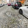 Una immagine delle buche di via Parma Una immagine delle buche di via Parma