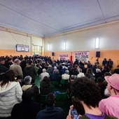 Un momento dell'assemblea in via Buniva Un momento dell'assemblea in via Buniva
