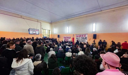 Un momento dell'assemblea in via Buniva