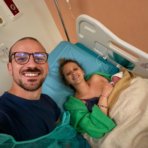 Papà e mamma con il piccolo Andrea Massimo Papà e mamma con il piccolo Andrea Massimo