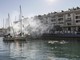 "No port for genocide": il Manifesto Opera Viva firmato dal reporter Fabio Bucciarelli "No port for genocide": il Manifesto Opera Viva firmato dal reporter Fabio Bucciarelli