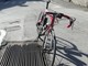 Bicicletta nella griglia in via Davico a Pinerolo