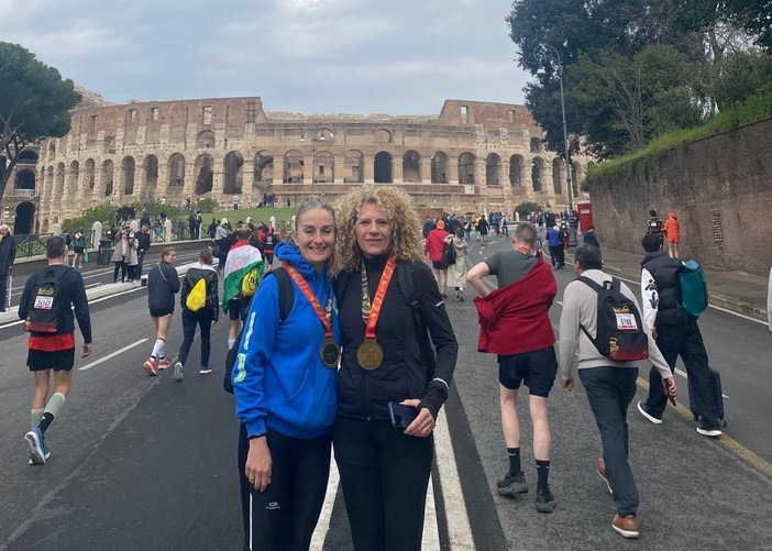 Da sinistra, Bertalot e Severini con il Colosseo sullo sfondo