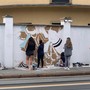 Ragazzi al lavoro in via Bologna