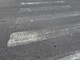 Strisce sbiadite in via Lancia Strisce sbiadite in via Lancia