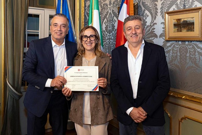 Lorena Salvatico e Alberto Vinai premiati dal vicepresidente Franco Graglia
