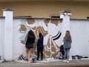 Ragazzi al lavoro in via Bologna