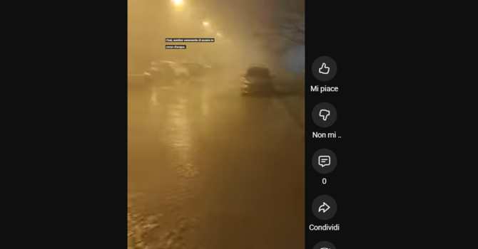 L'immagine della strada allagata a Grugliasco, la scorsa notte