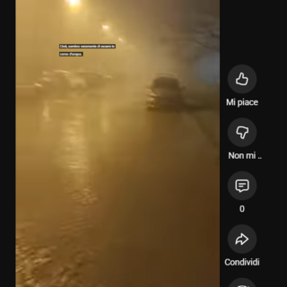 L'immagine della strada allagata a Grugliasco, la scorsa notte